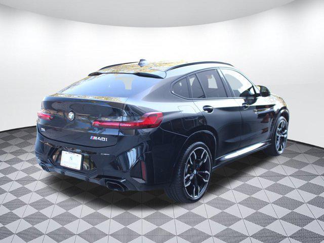 used 2024 BMW X4 car, priced at $56,999
