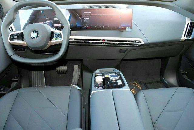 new 2026 BMW iX car, priced at $92,720