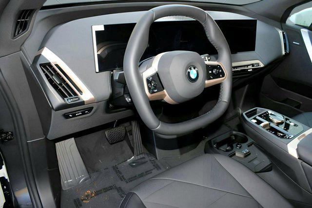 new 2026 BMW iX car, priced at $92,720