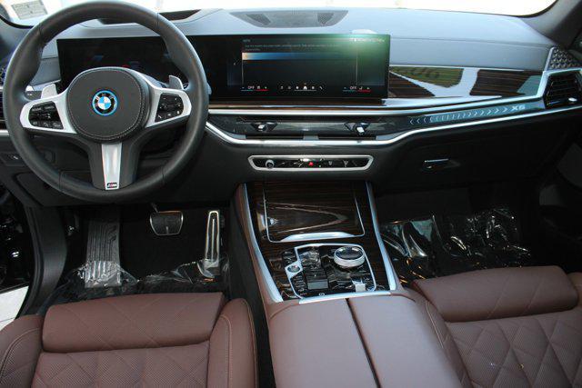 used 2025 BMW X5 PHEV car, priced at $79,999