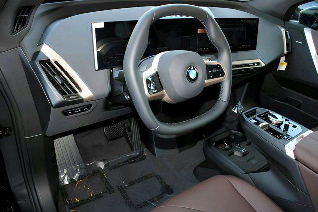 new 2026 BMW iX car, priced at $91,920
