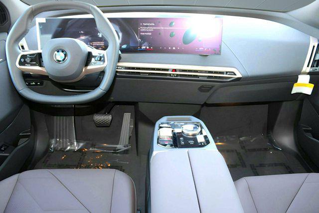 new 2026 BMW iX car, priced at $91,920