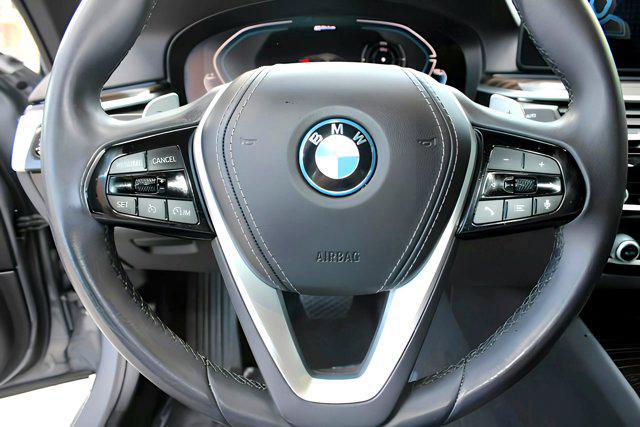 used 2023 BMW 530e car, priced at $34,397