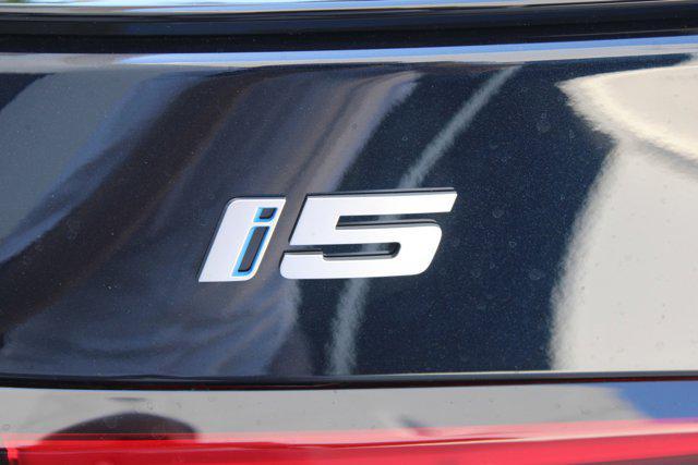 new 2025 BMW i5 car, priced at $98,620