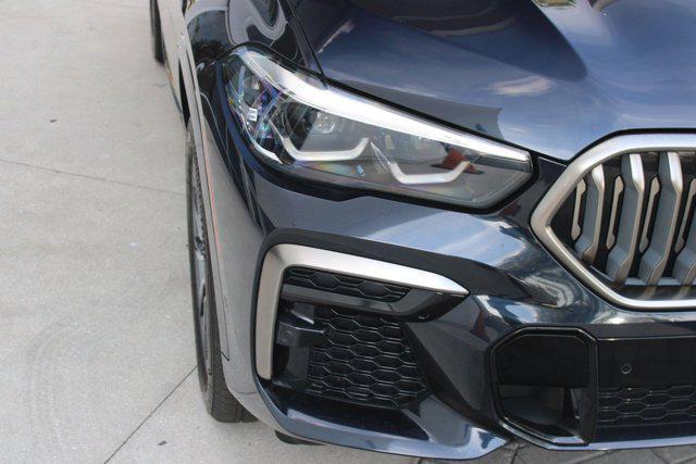 used 2022 BMW X6 car, priced at $59,999