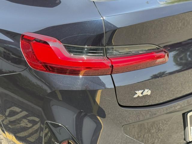 used 2022 BMW X4 car, priced at $43,217
