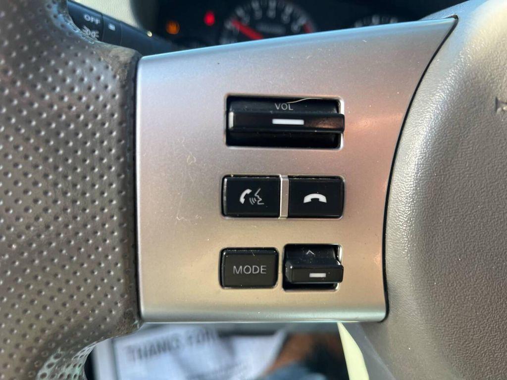 used 2013 Nissan Frontier car, priced at $14,995