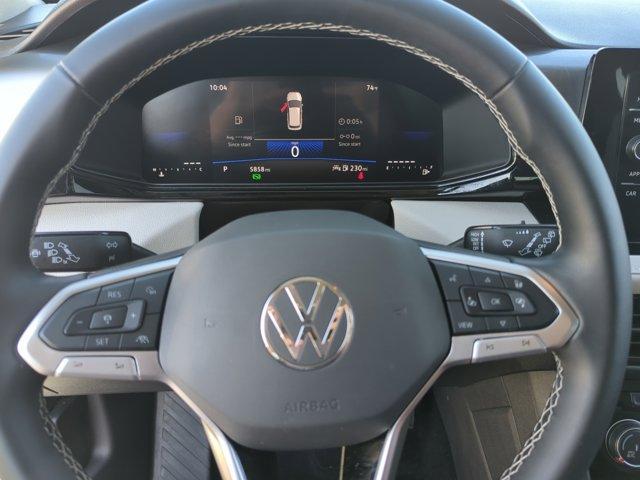 used 2025 Volkswagen Taos car, priced at $22,998