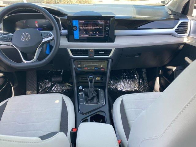 new 2025 Volkswagen Taos car, priced at $30,671
