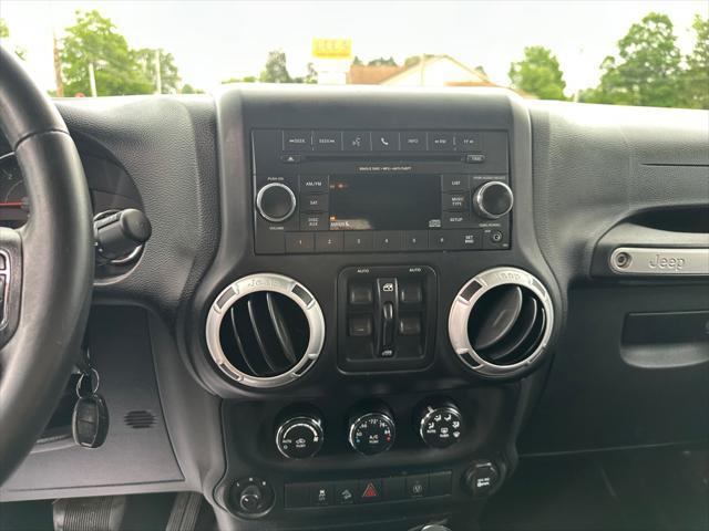 used 2014 Jeep Wrangler Unlimited car, priced at $13,990
