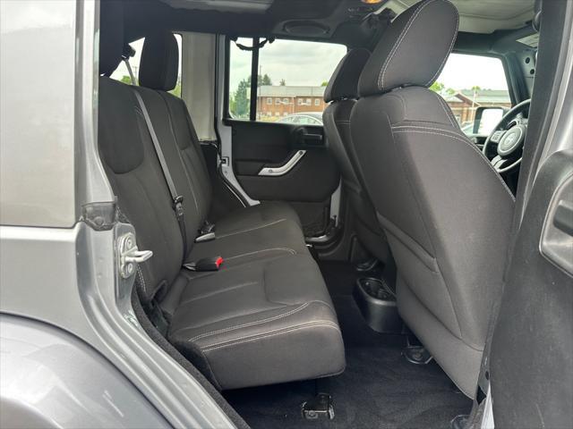 used 2014 Jeep Wrangler Unlimited car, priced at $13,990