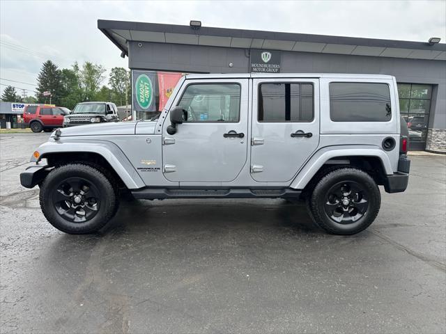 used 2014 Jeep Wrangler Unlimited car, priced at $13,990