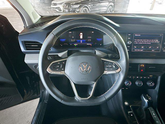 used 2023 Volkswagen Taos car, priced at $23,499