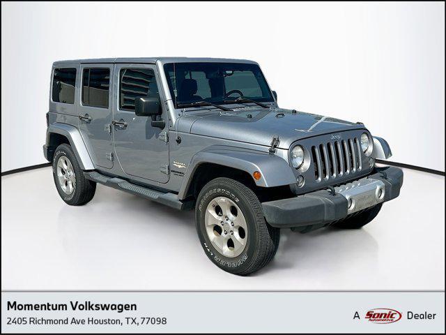 used 2015 Jeep Wrangler Unlimited car, priced at $20,996