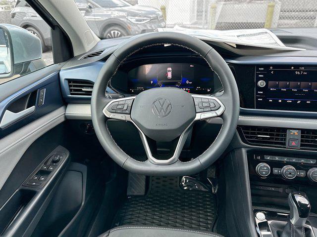 new 2024 Volkswagen Taos car, priced at $29,610