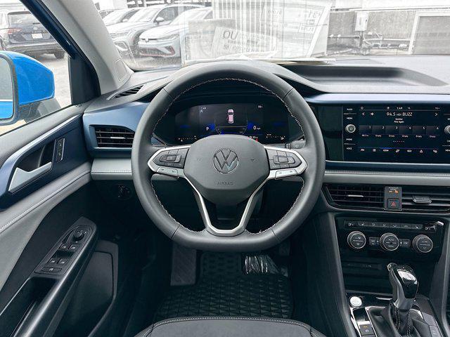 new 2024 Volkswagen Taos car, priced at $29,621