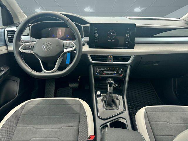new 2025 Volkswagen Taos car, priced at $31,221