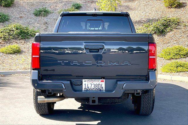 used 2025 Toyota Tacoma car, priced at $47,299