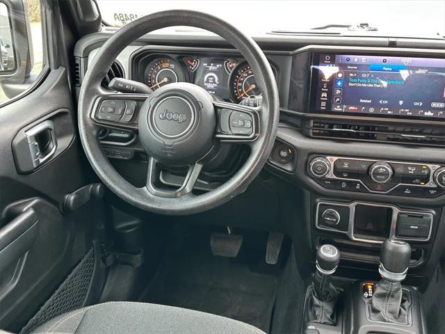 used 2024 Jeep Wrangler car, priced at $29,998