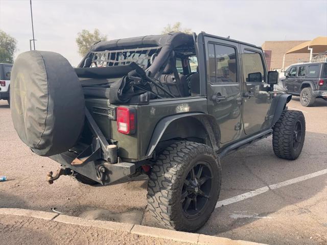 used 2015 Jeep Wrangler Unlimited car, priced at $15,988