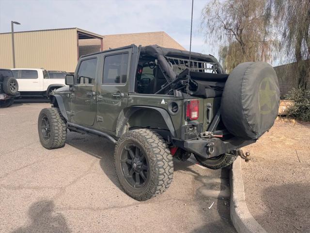 used 2015 Jeep Wrangler Unlimited car, priced at $15,988