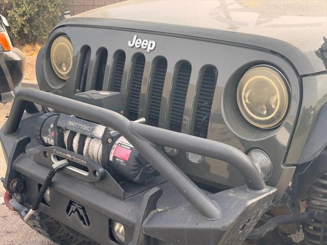 used 2015 Jeep Wrangler Unlimited car, priced at $15,988