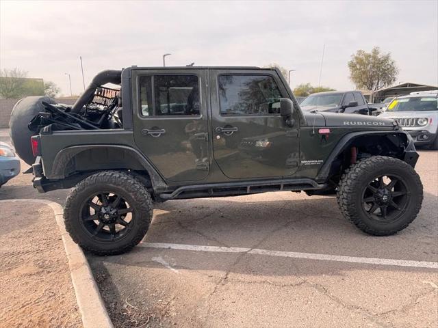 used 2015 Jeep Wrangler Unlimited car, priced at $15,988