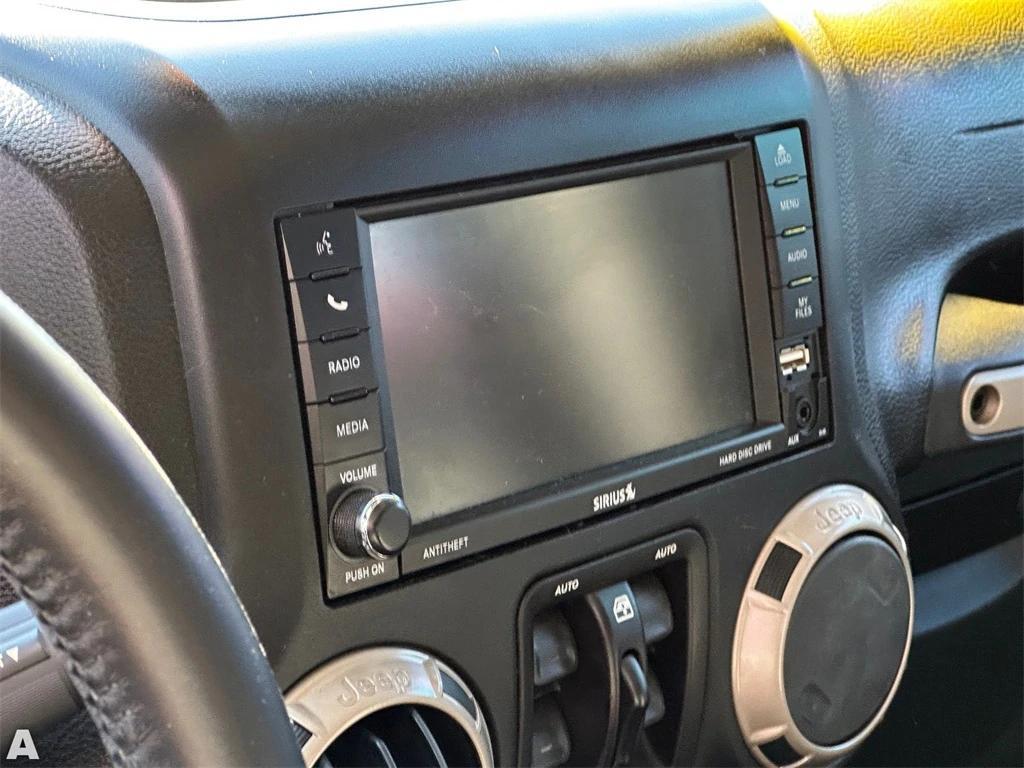 used 2016 Jeep Wrangler Unlimited car, priced at $24,951
