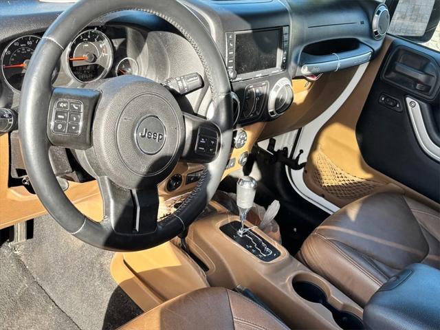 used 2015 Jeep Wrangler Unlimited car, priced at $18,788