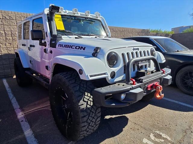 used 2014 Jeep Wrangler Unlimited car, priced at $25,988