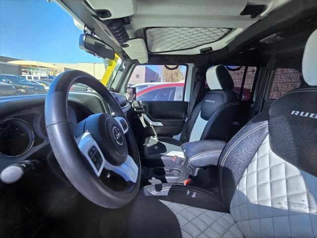 used 2014 Jeep Wrangler Unlimited car, priced at $25,988