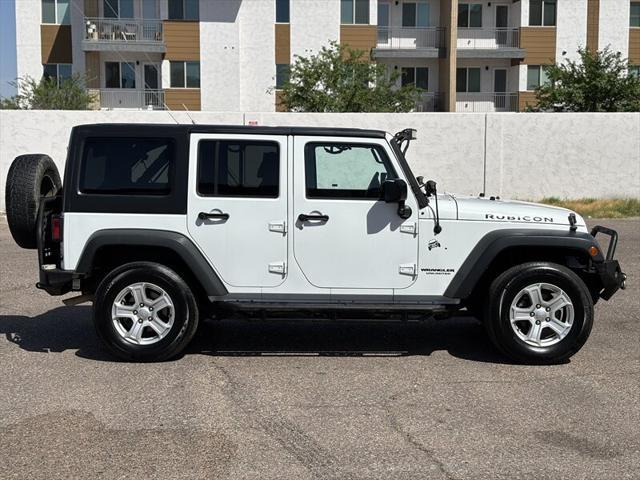 used 2015 Jeep Wrangler Unlimited car, priced at $17,988