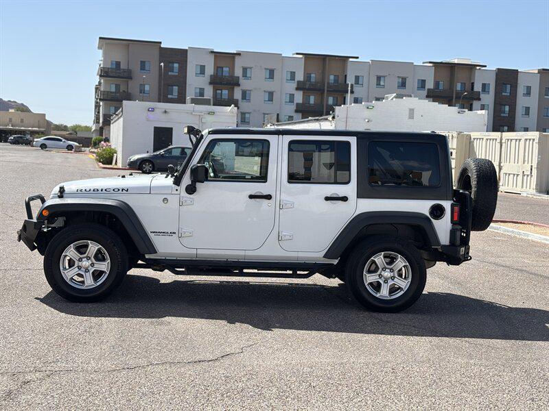 used 2015 Jeep Wrangler Unlimited car, priced at $16,988