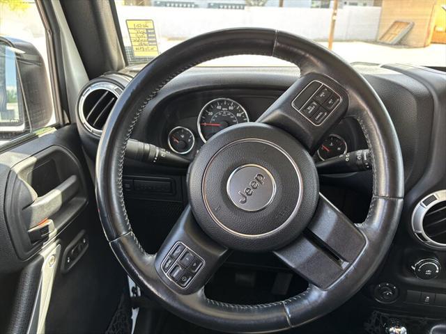 used 2015 Jeep Wrangler Unlimited car, priced at $17,988