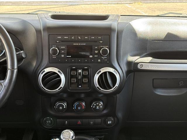 used 2015 Jeep Wrangler Unlimited car, priced at $17,988
