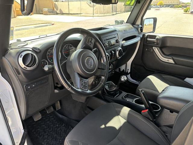 used 2015 Jeep Wrangler Unlimited car, priced at $17,988