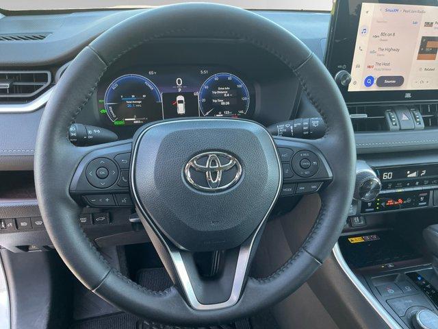 used 2024 Toyota RAV4 Hybrid car, priced at $45,000