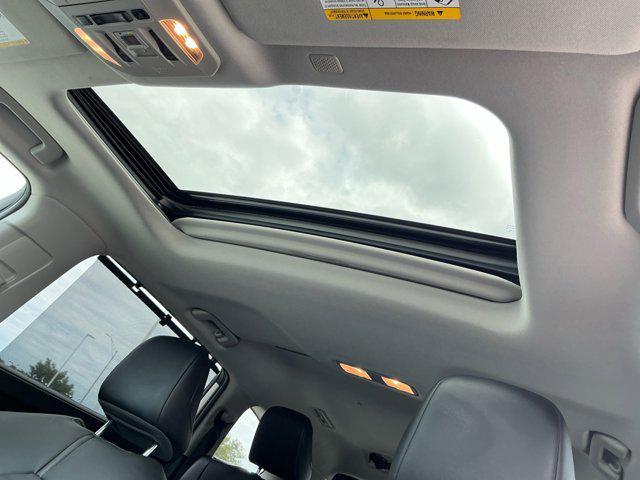 used 2021 Toyota Highlander Hybrid car, priced at $30,000