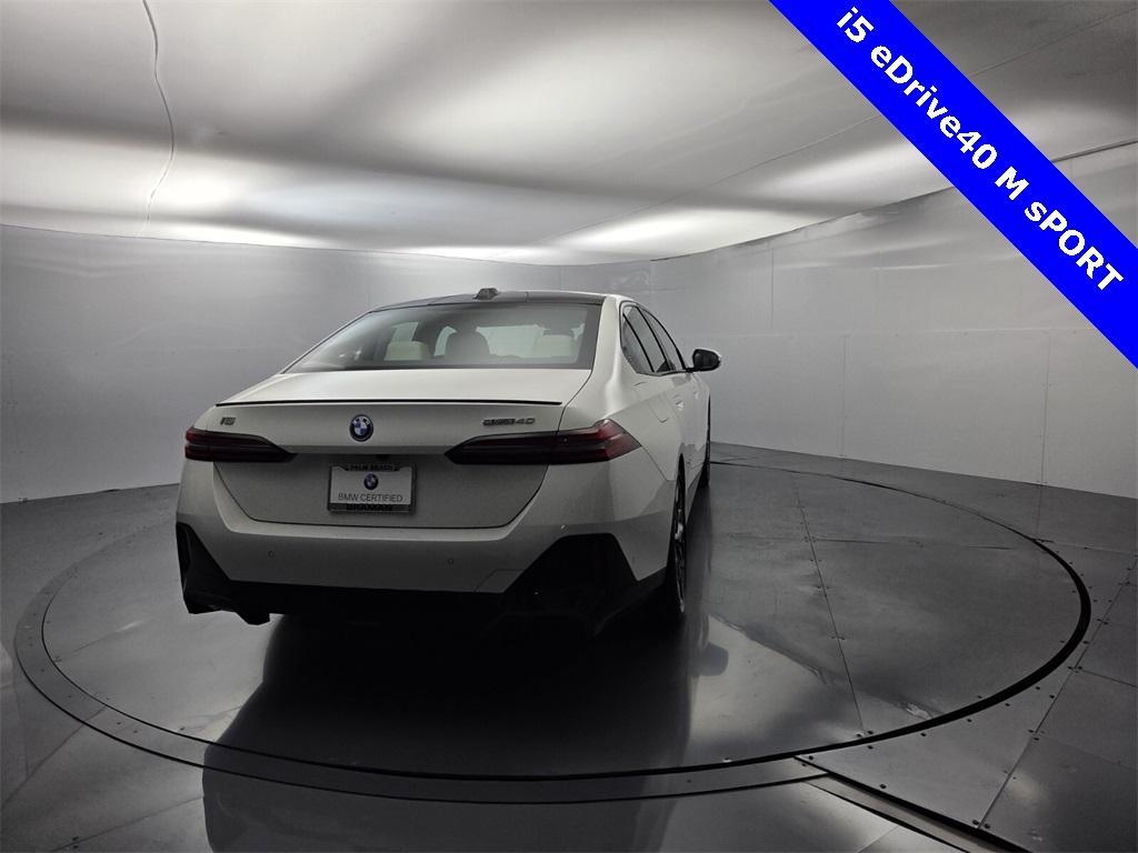 used 2024 BMW i5 car, priced at $53,995