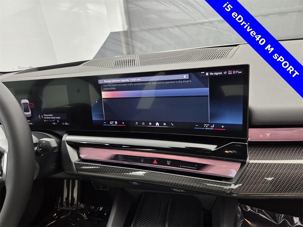 used 2024 BMW i5 car, priced at $53,995