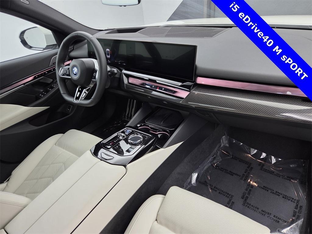 used 2024 BMW i5 car, priced at $53,995