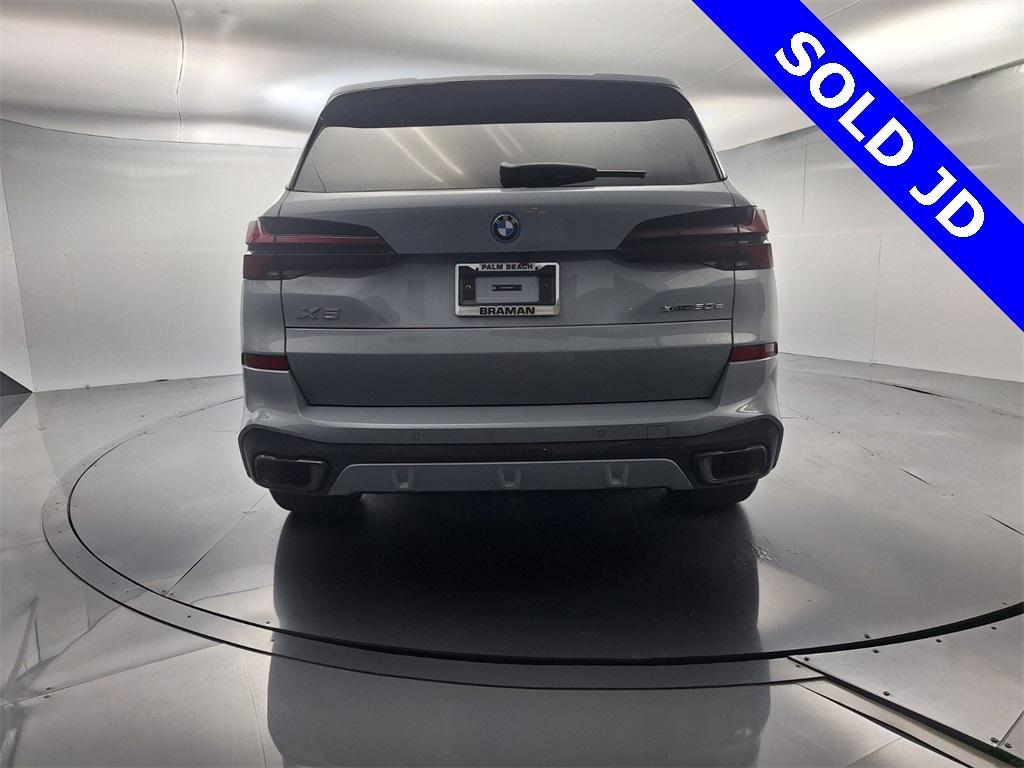 used 2026 BMW X5 PHEV car, priced at $76,695