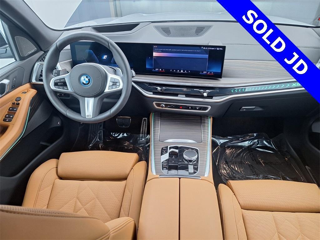 used 2026 BMW X5 PHEV car, priced at $76,695