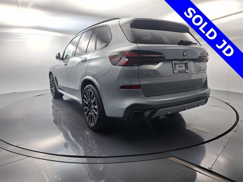 used 2026 BMW X5 PHEV car, priced at $76,695