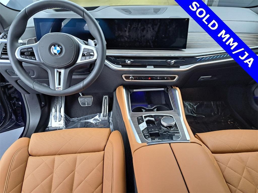 used 2025 BMW X6 car, priced at $92,995