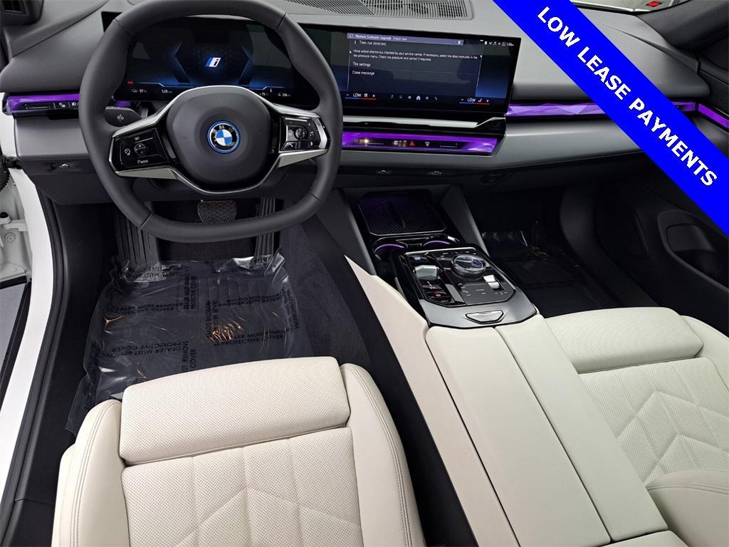 used 2024 BMW i5 car, priced at $56,995