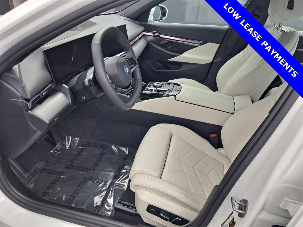 used 2024 BMW i5 car, priced at $56,995