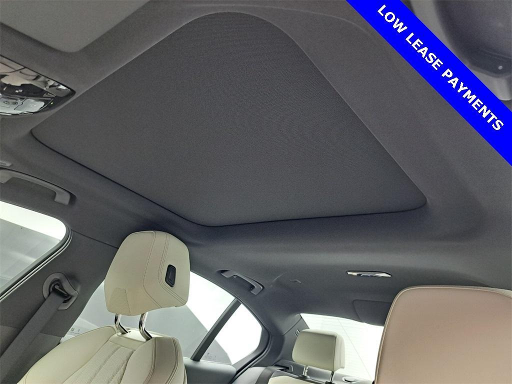 used 2024 BMW i5 car, priced at $56,995