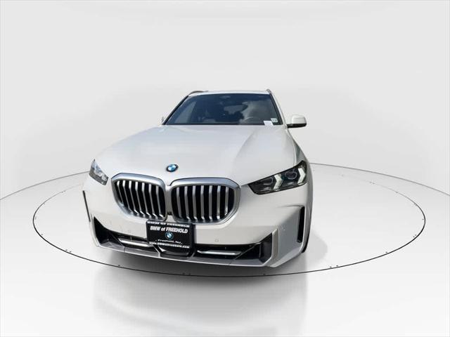 used 2025 BMW X5 car, priced at $68,990