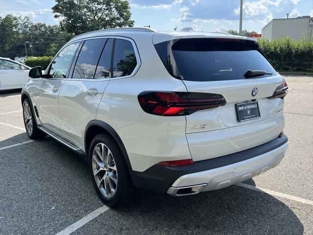 used 2025 BMW X5 car, priced at $68,990